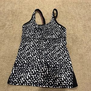 Black and white compression lululemon tank top with built in sports bra